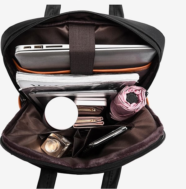 Unisex travel backpack with a dedicated laptop sleeve, made from durable, water-resistant Oxford material.