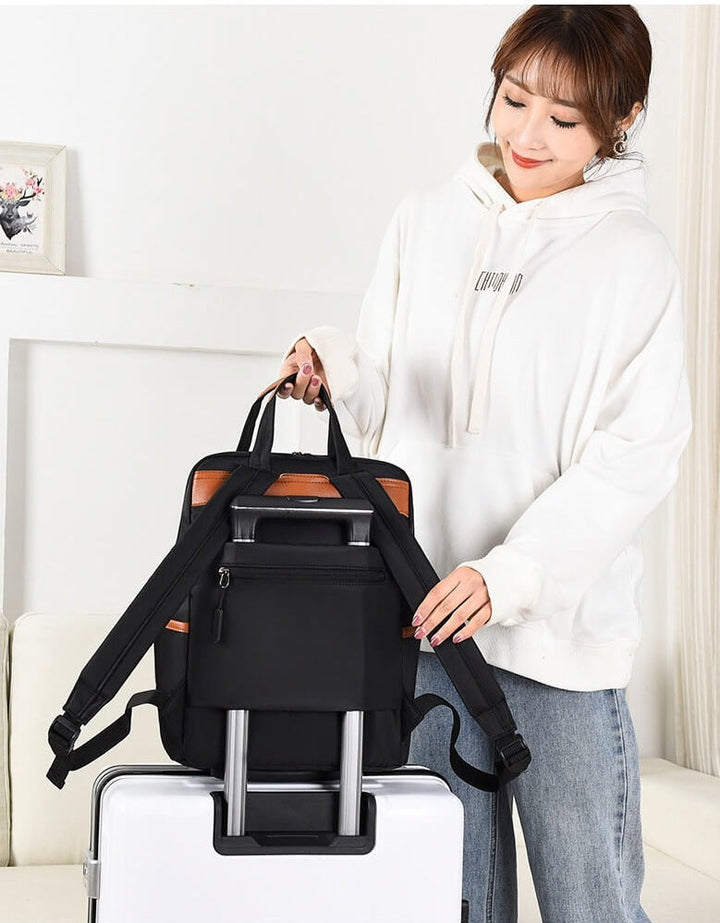 Back view: Secure anti-theft travel backpack with ergonomic straps & water-resistant Oxford design.
