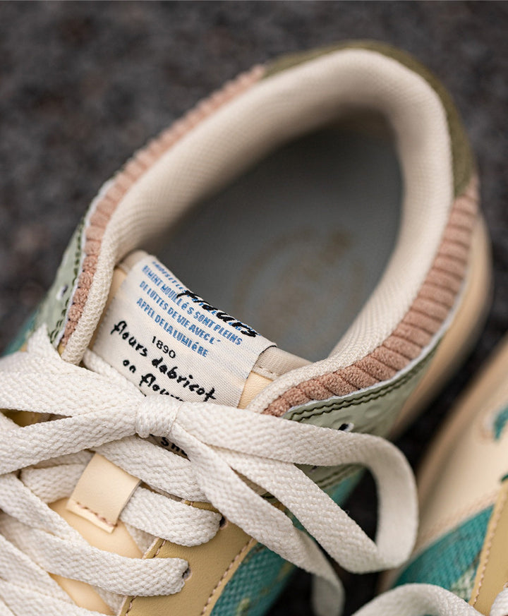 Experience comfort & art with these unisex Almond Blossom print sneakers, inspired by Van Gogh.
