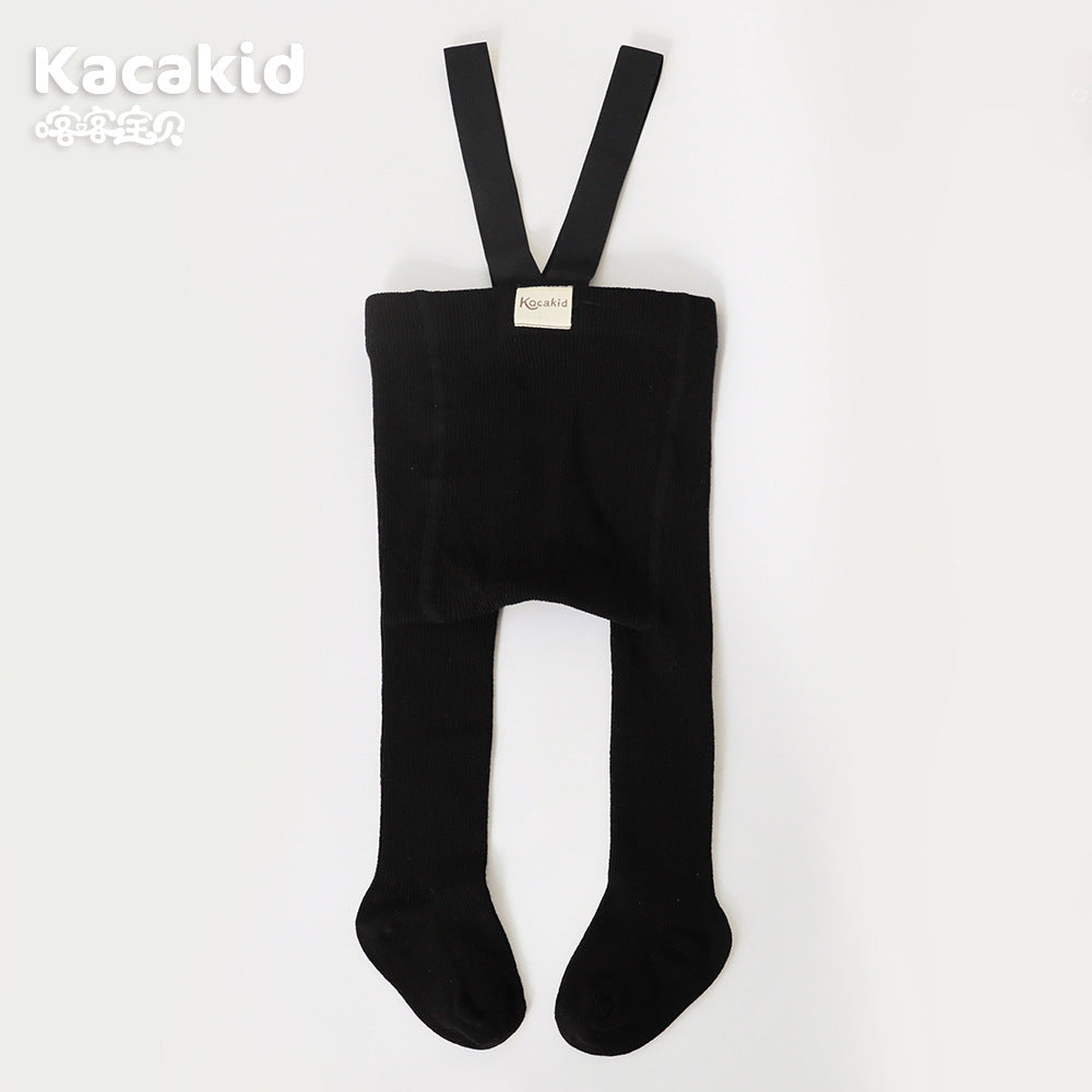 Grey knitted high-waisted baby pants, essential unisex baby clothing for everyday wear.