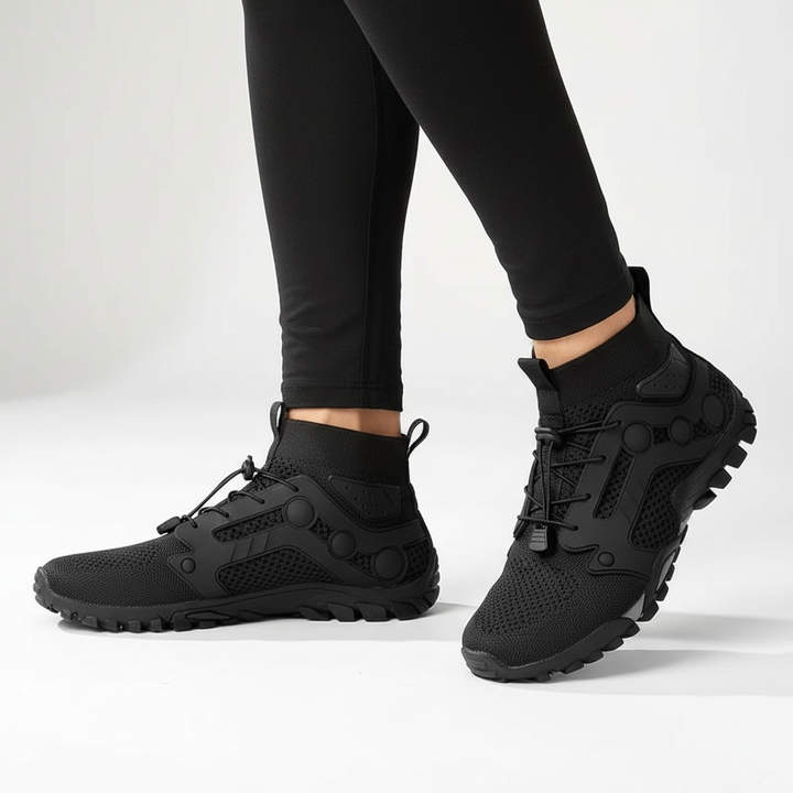 Unisex barefoot 'Cameron' trekking shoes, high-shaft in grey, shown with lightweight outdoor gear
