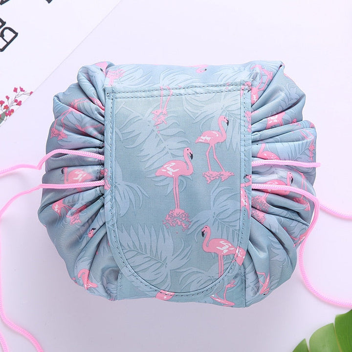 Drawstring toiletry bag for men and women, filled with travel-sized hygiene products