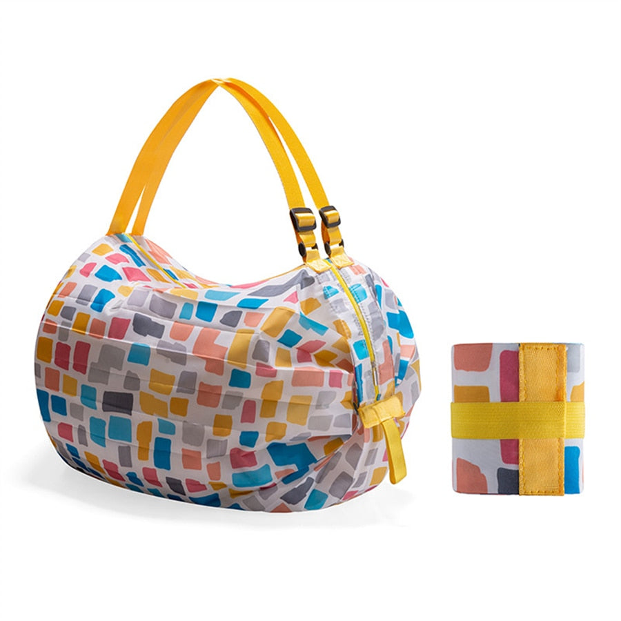 Unisex black foldable reusable shopping tote bag made from durable oxford fabric, ideal for groceries and travel.