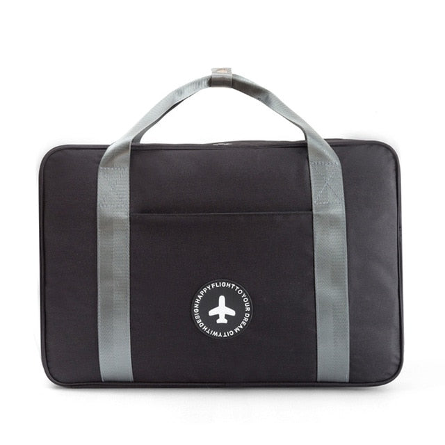 Stylish black unisex carry-on bag with wheels and handle, essential travel accessory