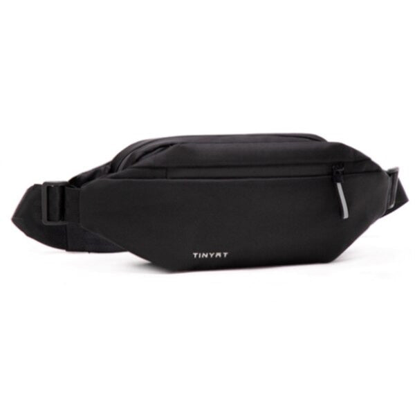 Outdoor shot of a durable water-resistant fanny pack, emphasizing multi-pocket storage and unisex design