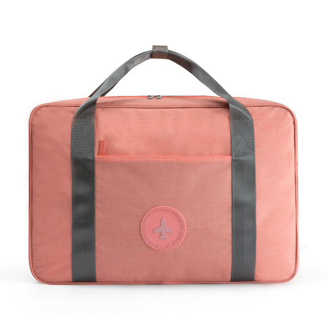 Lightweight unisex carry-on travel bag, perfect for overhead compartments. Essential weekend bag & travel accessory.