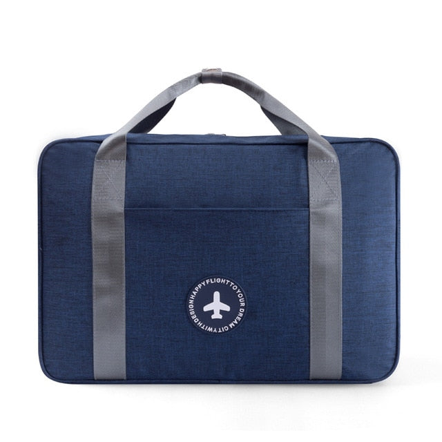 Organized unisex travel carry-on bag, designed to slide over any suitcase handle for hassle-free airport travel.