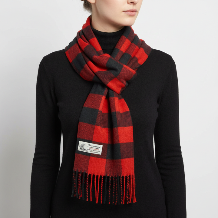 Unisex cashmere-feel plaid scarf, elegantly draped, featuring a timeless Stewart tartan design for warmth and style