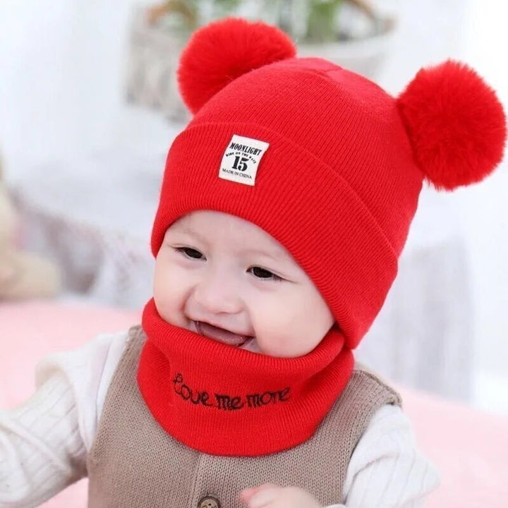 Collection of colorful children's knitted pom-pom hats, designed for warmth and style.