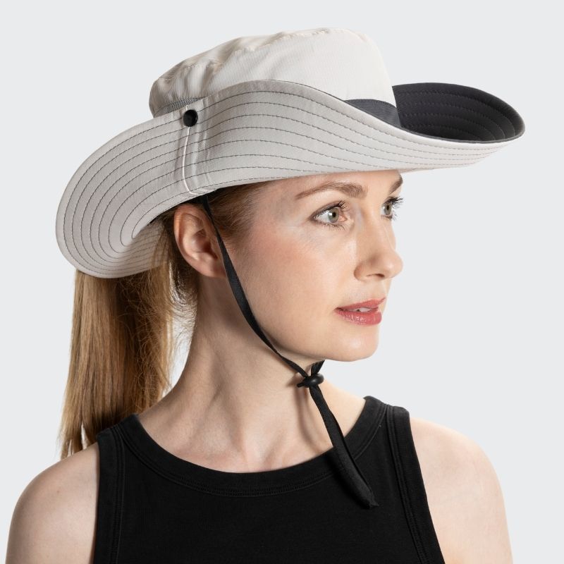 Essential Clara sun hat for men and women, offering sun protection at festivals, beach & travel. Adjustable comfort.