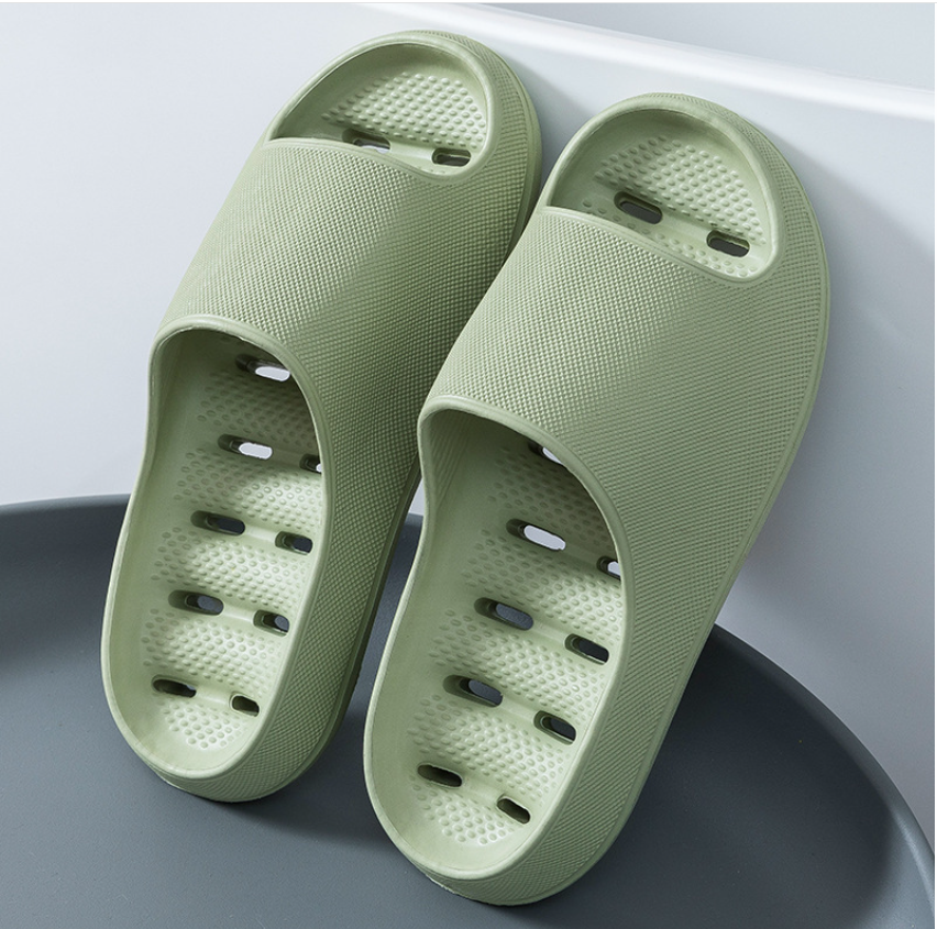 Soft unisex non-slip shower slippers for spa-like comfort at home. Lightweight indoor footwear with cloud cushioning.
