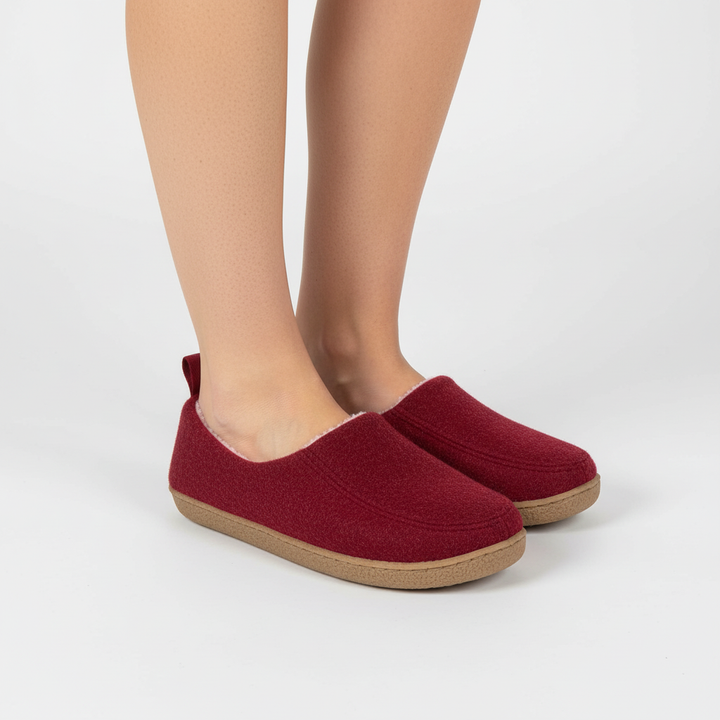 Side view of unisex felt slippers with a robust non-slip sole, perfect for house wear