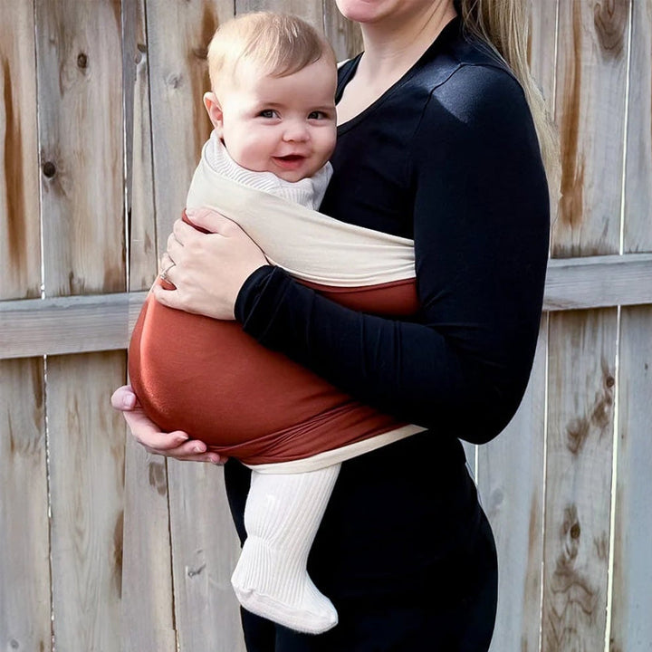 Versatile baby wrap carrier, a parenting essential for comfortable, hands-free bonding & support.