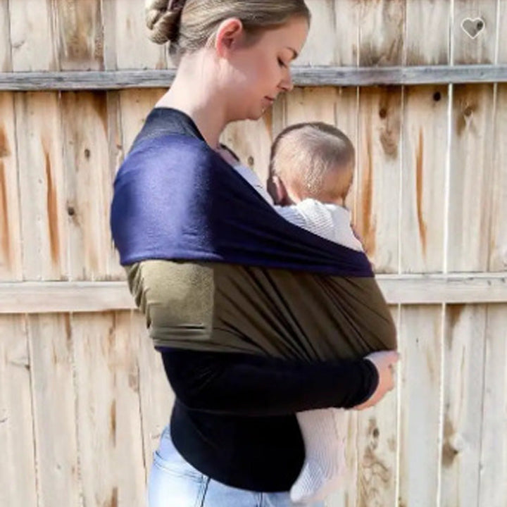 Stylish unisex baby wrap carrier in soft material for comfortable, hands-free support.