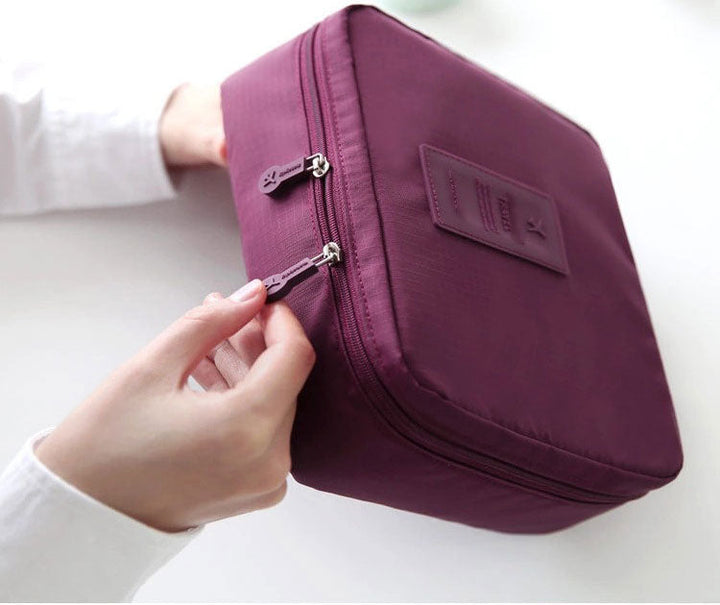 Compact beauty accessories storage, waterproof and unisex, perfect for travel organization.