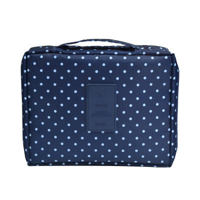 Waterproof makeup organizer bag, portable for travel, keeps cosmetics and toiletries secure.