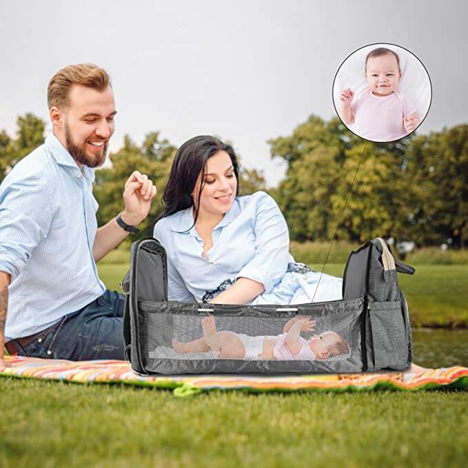 Baby travel essential: convertible nappy backpack with a fully extended foldable bassinet