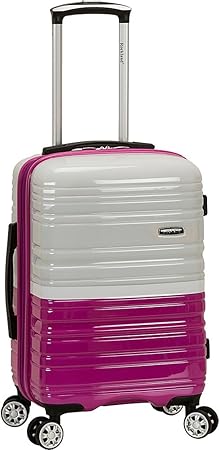 Sleek 2tone navy carry-on suitcase. Expandable, lightweight hardside with spinner wheels. Essential for short trips.