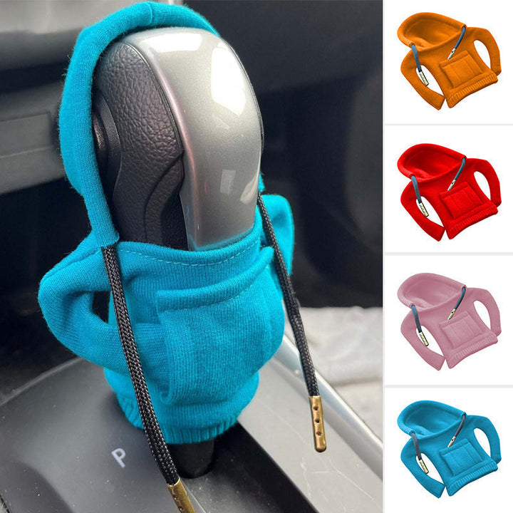 Green cotton gear shift cover, vibrant car accessory for shift knob protection & style.