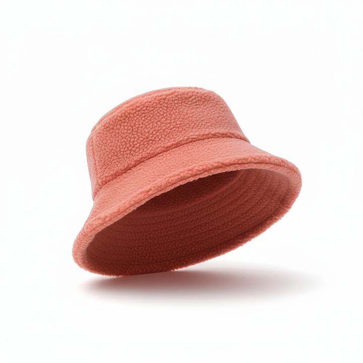Warm and stylish white fleece bucket hat, perfect for winter fashion and outdoor activities