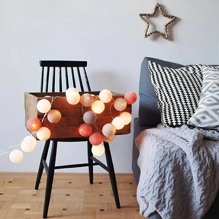 Soft glow string lights with cotton balls, creating a festive and romantic ambiance.