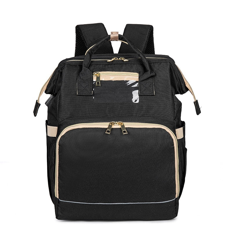 Convertible diaper backpack unfolded into a safe, portable bassinet for baby on-the-go travel.