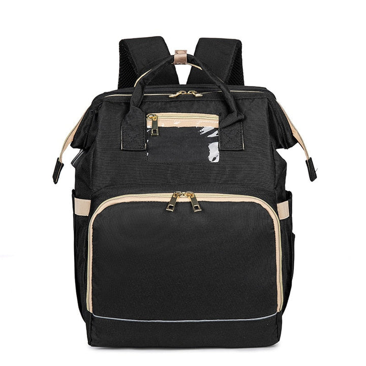 Convertible diaper backpack unfolded into a safe, portable bassinet for baby on-the-go travel.