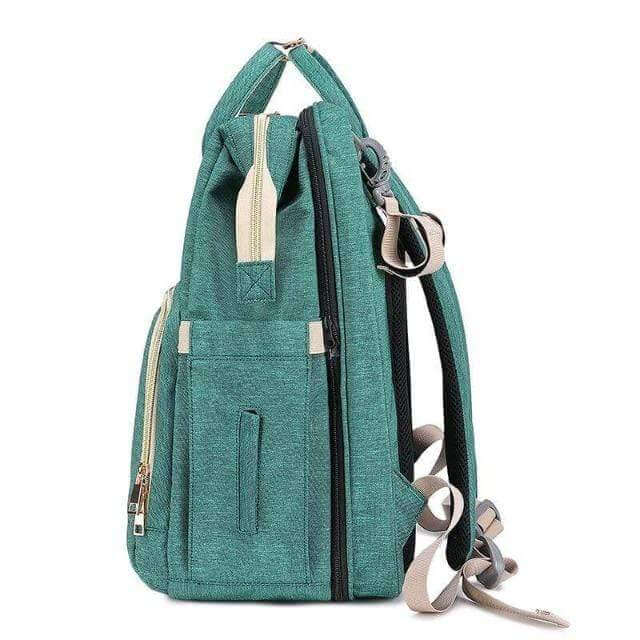 Premium zippers & padded shoulder straps on a durable, convertible diaper backpack for comfortable wear.