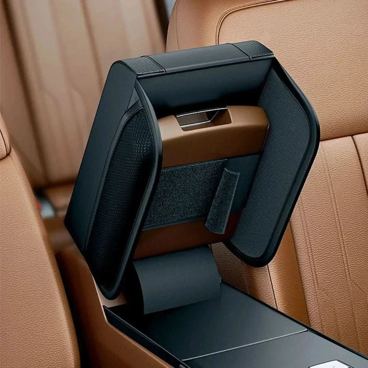 Black leather car armrest pad, memory foam for support, featuring a universal fit & hidden storage.