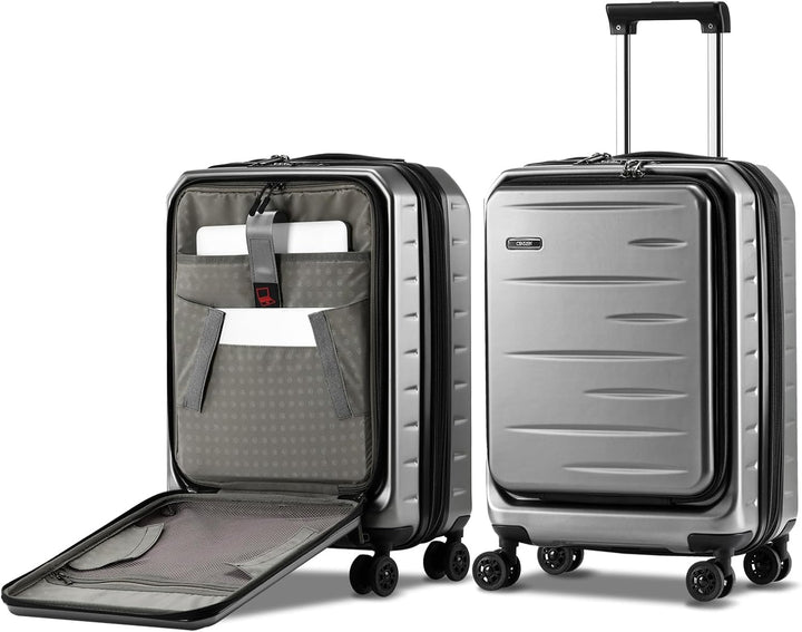 Detail of the integrated TSA lock on a unisex expandable hardshell carry-on luggage.