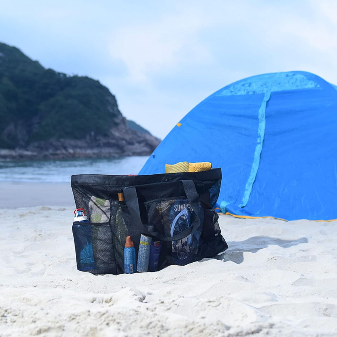 Roomy mesh beach tote bag with comfortable handles and zipper top, perfect for family outings.