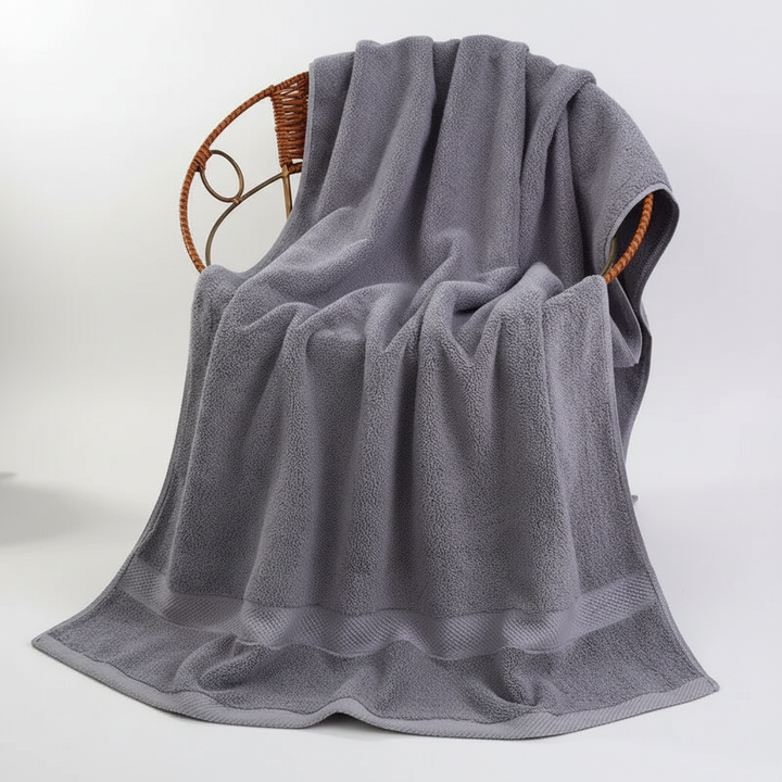 Royal blue extra large bath towel on hook, quick-dry cotton, perfect for spa