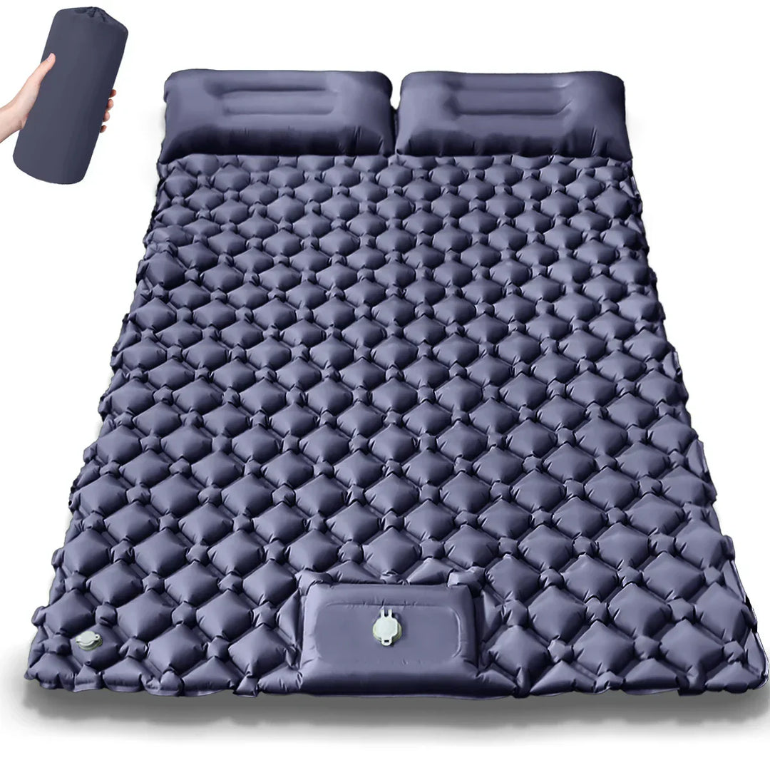 Unisex inflatable mattress from the Kieran line, ready for use in a camping environment