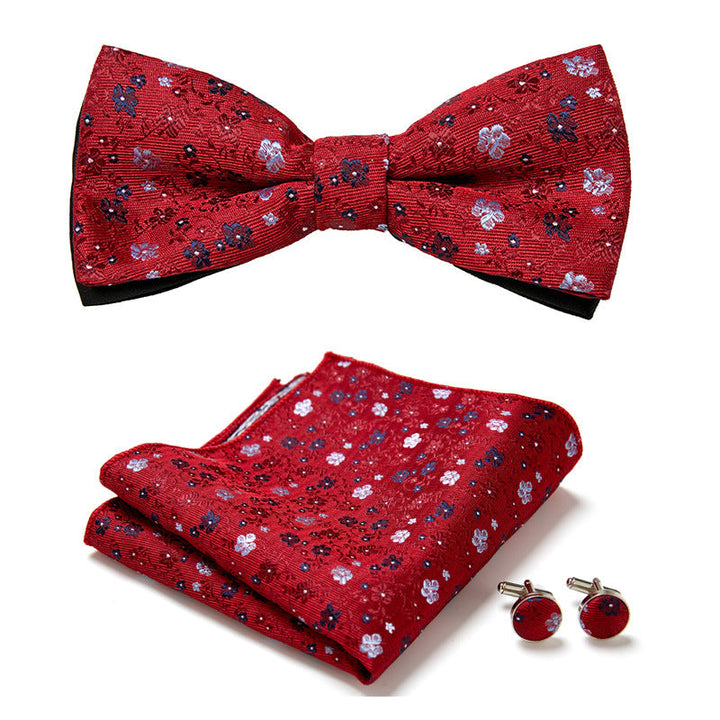 Stylish floral pattern bow tie set for men, complete with pocket square and cufflinks for a dapper look.