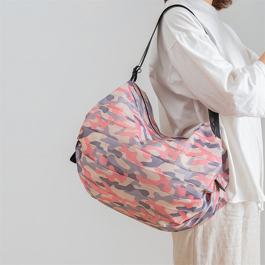 Convenient foldable reusable tote bag for shopping & travel. Unisex, lightweight, and durable.