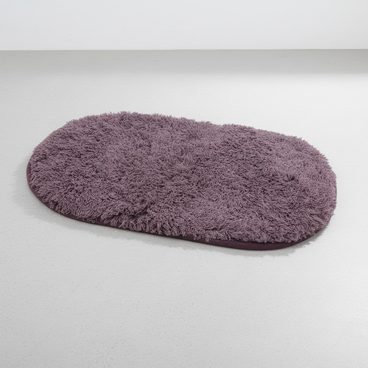 Absorbent microfiber bath mat, non-slip design in a modern gray, enhancing any bathroom decor.