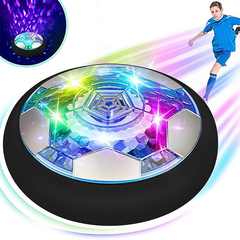 Family playing indoors with a floating hover football. Electronic toy glides on all floors, fun for all ages.