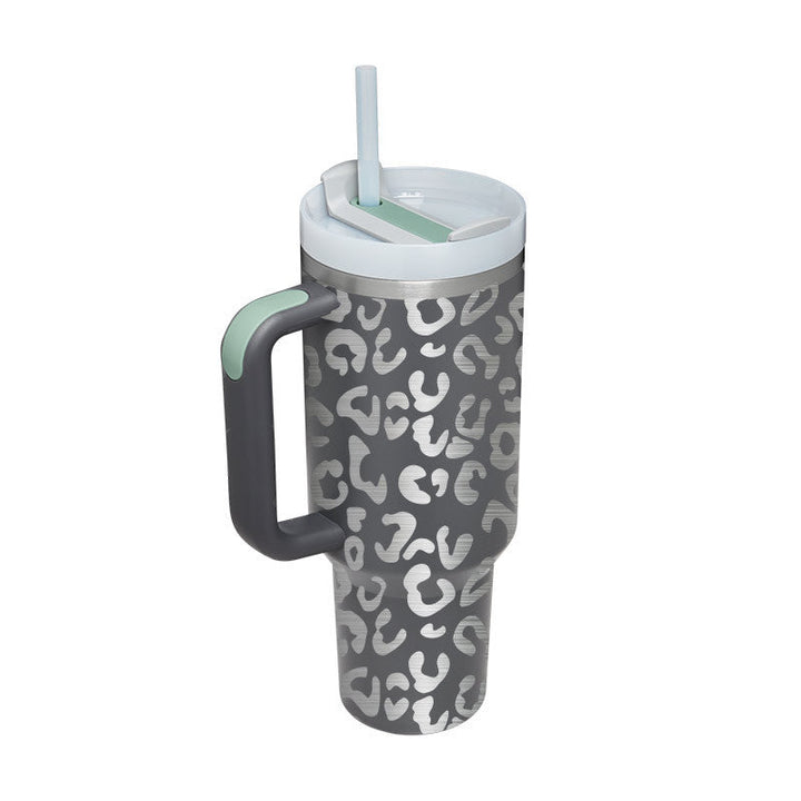 Modern insulated travel mug with handle & straw for everyday hot & cold drink enjoyment.