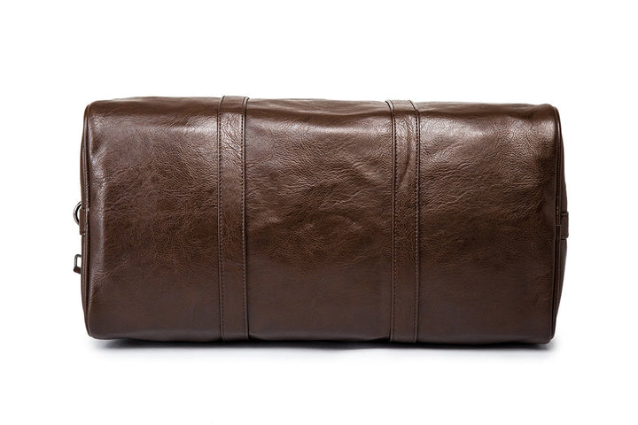 Modern unisex large duffel bag, PU leather, lightweight carry-on luggage solution.