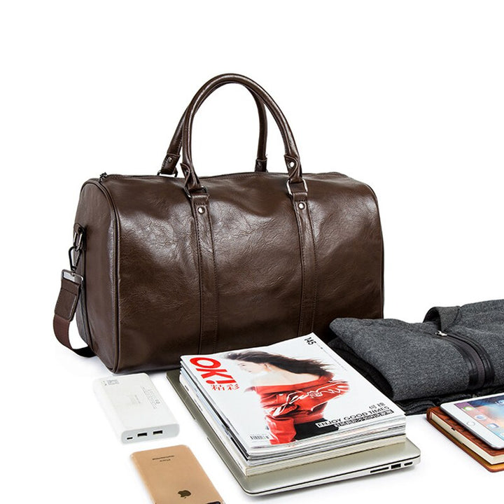 Travel accessory: durable PU leather weekend duffel bag, lightweight & unisex.