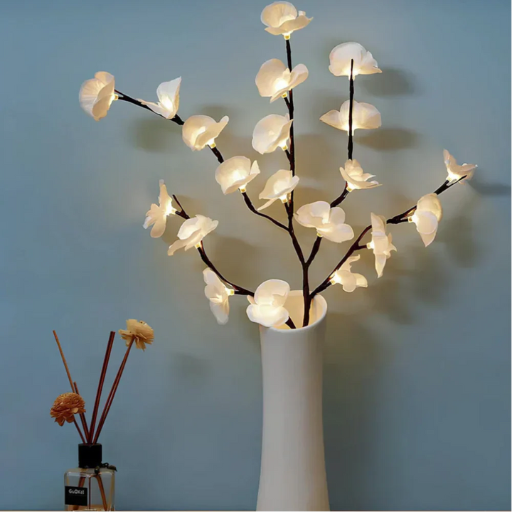 LED illuminated branches for event decor, creating a magical festive atmosphere