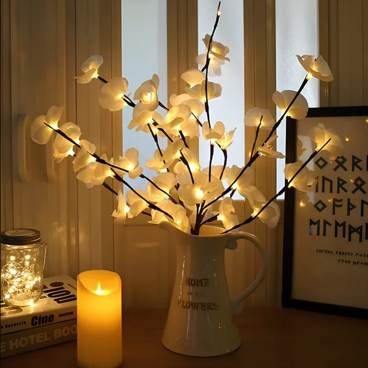 Close-up of LED lit branches, showcasing warm ambient light for any room decoration
