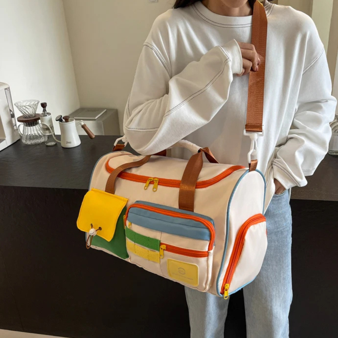 Unisex lightweight FlexaBag duffle with blue, green, & orange color blocks. Perfect for gym or travel.