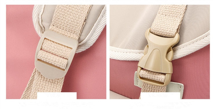 Front view of a lightweight water-resistant travel backpack, showing multiple zippers and pockets