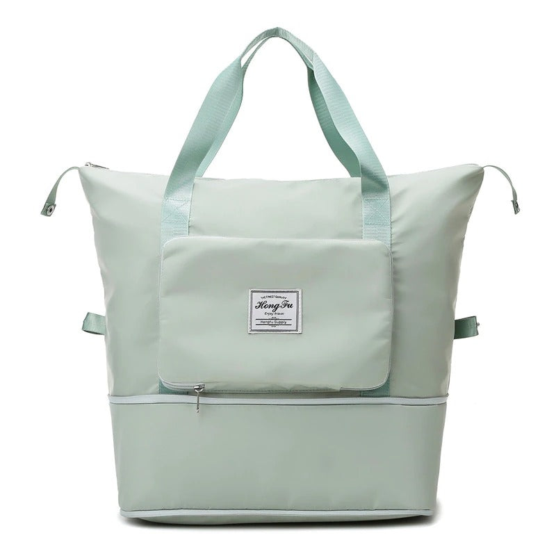 Stylish unisex waterproof travel duffel, versatile for gym, overnight or carry-on.