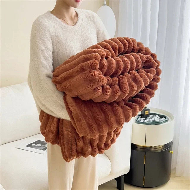 Stylish unisex plush throw blanket in a neutral color, a versatile home essential