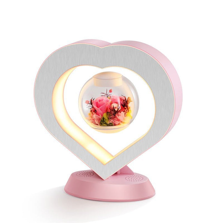 Floating flower lamp with magnetic rotation, a stylish table decor piece and unique gift for any home.