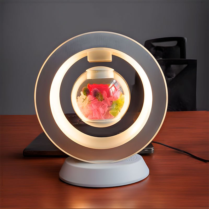 Modern magnetic levitation floating lamp, featuring a rotating flower for a captivating home accent.