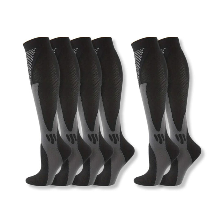 Graduated compression socks providing targeted relief for leg pain, swelling & fatigue reduction.