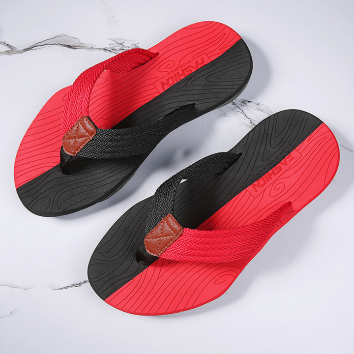Side profile of unisex orthopedic flip flops, showcasing ergonomic design & robust arch support.